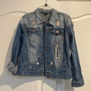 Washed denim jacket. Soft and comfy with stylish rips on the front